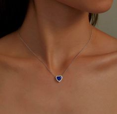 Elegant and sophisticated. This halo heart necklace features a blue lab-grown sapphire center stone surrounded by Lafonn's signature Lassaire simulated diamonds. The necklace is set in sterling silver bonded with platinum. Lab-grown sapphires have the exact same chemical, mineral, and optical properties as natural sapphires which vary in color, texture and pattern. We make every effort to keep our lab-grown sapphire stone colors consistent. However, all lab-grown sapphires may not be exactly as Sapphire Stone, Natural Sapphire, Heart Necklace, Lab Grown, Stone Color, Halo, Platinum, Sapphire, Fine Jewelry