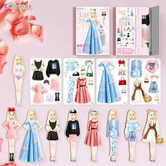 the paper dolls are lined up next to each other on a pink surface with flowers in the background