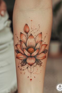 a woman's leg with a flower tattoo on it