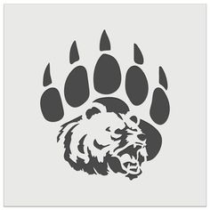 an animal paw print on a gray background with black and white colors, including the bear's claws