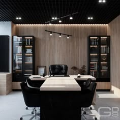 an office with black leather chairs and a wooden table in the center, along with built - in bookshelves