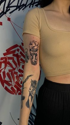 a woman with a tattoo on her arm