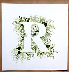 the letter r is surrounded by leaves and birds