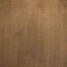 an image of a brown background that looks like it has been painted with acrylic