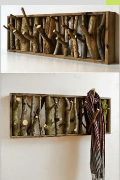 two pieces of art made out of wood with branches hanging on the wall and one piece is