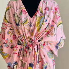 This Kaftan, Made From Incredibly Soft And Lightweight Cotton, Is Versatile For Many Occasions. Perfect For A Swimsuit Cover Up On The Beach Or By The Pool, With Shorts And A Tank Top Or Over A Summer Dress. Can Be Also Worn With A Glam Belt For A More Dressed Up Look For Lunch. It Compliments All Body Types With Its Long, Hangs Loose Design. It Can Be Worn In Many Different Stylish Ways To Make You Look Your Best! The Cotton Tie Accent At The Waist Makes It Easy For You To Wear. * This Beautifu Pink Printed Kaftan For Beach Cover-up, Pink Floral Print Free Size Dress, Floral Print Kaftan For Spring Loungewear, Spring Floral Print Kaftan For Loungewear, Pink V-neck Tunic For Beach Cover-up, Free Size Tunic Kaftan For Spring, Printed Loungewear Dress With Kimono Sleeves, Printed Dresses With Kimono Sleeves For Loungewear, Daywear V-neck Printed Kaftan