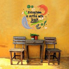 two wooden chairs sitting in front of a table with a sign that says thai food on it