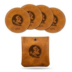 four leather coasters with the logo of ase and an image of a man's head