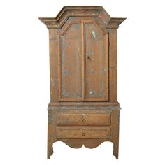 an old wooden armoire with two drawers on one side and a drawer on the other