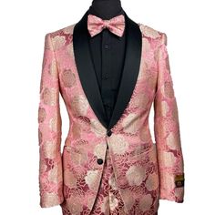 "This Pink Floral Tuxedo Is Perfect For Any Event Where You Want To Make A Statement. It Features A Floral Fabric With A Satin Shawl Lapel. Comes With Matching Slim Flat Front Pants And A Matching Oversized Bowtie." Festive Pink Formal Suit, Festive Fitted Pink Suits, Festive Pink Elegant Suit, Pink Fitted Wedding Bottoms, Pink Fitted Bottoms For Wedding, Pink Fitted Formal Pants, Elegant Fitted Pink Pants, Elegant Pink Fitted Pants, Luxury Fitted Pink Tuxedo