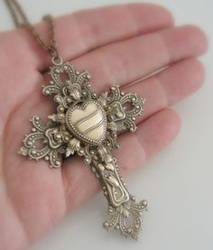 "Vintage Jewelry - Vintage Necklace - Victorian Necklace - Cross Necklace - Brass Necklace - Religious Jewelry - Chloe's handmade jewelry This is such a gorgeous vintage piece. An extraordinary layered cross. Exquisite floral,heart and filigree detail with a rich patina. The pendant hangs from a lovely vintage ladder chain. Chloe says, \"Wear it and feel fabulous!\" The pendant is 4\" long and 2 1/4\" wide. You can choose the necklace length you would like at checkout. Thanks for visiting Chloe' Chloe Jewelry, Art Nouveau Necklaces, Victorian Necklace, Trendy Jewerly, Bainbridge Island, Dope Jewelry, Funky Jewelry, Brass Necklace, Victorian Jewelry