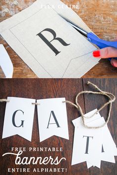 a person cutting out letters with scissors on top of a piece of paper that says, free printable banners entire alphabet