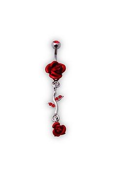 a pair of red roses dangling from the end of a navel bar with leaves on it