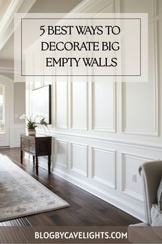 a living room with white walls and wood floors, the words 5 best ways to decorate big empty walls