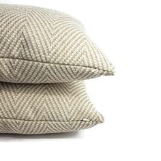 two pillows sitting on top of each other