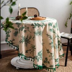 the table is covered with a green and white cloth