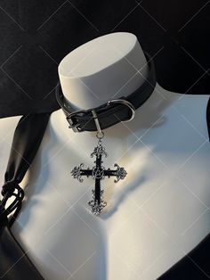 Embrace the edgy and punk vibe with our dark punk cross choker. This unique choker exudes a gothic and alternative aesthetic, perfect for expressing your individuality and subculture style. The choker features a striking cross pendant, adding a bold statement to your look.   Please note that this product includes one choker only. Affordable Metal Punk Choker, Emo Choker, Gothic Belt, Punk Aesthetics, Alternative Accessories, Punk Choker, Unique Choker, Vampire Necklace, Dark Punk