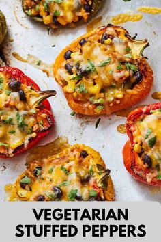 baked stuffed peppers with black beans and cheese on a baking sheet, ready to be eaten