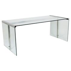 a glass and metal console table on white background