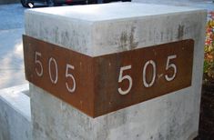 a cement block with the number 505 on it