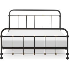 a black metal bed frame with white sheets and gold studded headboard on an isolated white background