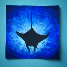 a painting of a manta ray on a blue background