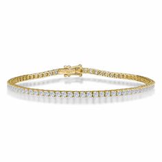 Description Diamond Tennis Bracelet Women There are few pieces more classic and timeless than a diamond tennis bracelet. Now, a diamond tennis bracelet without the mark-ups is finally here. This 14k gold diamond tennis bracelet is the perfect accessory for any occasion, versatile enough to wear both day and night. This tennis bracelet features round brilliant cut diamonds with a carat weight between 1 - 5 ctw set in individual four-prong settings. We only use GH SI1 diamonds to make sure your br Tennis Anklet, Diamond Anklet, Gold Anklet, Diamond Choker, Diamond Tennis Bracelet, Bracelet Women, Ankle Bracelet, Chain Anklet, Tennis Bracelet Diamond