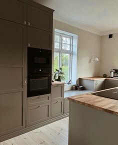 the kitchen is clean and ready for us to use in its new owner's home