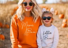 This mommy and me matching Halloween sweatshirt is the perfect way to coordinate all your little ghosts and gouls this season or get one just for you. Whether it's for Trecking trick or treaters or a casual Halloween event this sweater is cozy and universal. ideal for any situation, a unisex heavy blend crewneck sweatshirt is pure comfort. These garments are made from polyester and cotton. This combination helps designs come out looking fresh and beautiful. The collar is ribbed knit, so it retains its shape even after washing. There are no itchy side seams on these sweaters.  * 50% cotton, 50% polyester * Medium-heavy fabric (8.0 oz/yd² (271.25 g/m * Loose fit * Sewn-in label * Runs true to size You can find the matching baby body suit in our shop or at this link: https://ladybugdreambouti Matching Cotton Sweatshirt For Fall, Cotton Fall Sweatshirt, Family Matching Cotton Sweatshirt For Fall, Fall Crew Neck Sweatshirt, White Family Matching Sweatshirt For Fall, Halloween Sweater Outfit, Casual Halloween, Trick Or, Mom Outfit