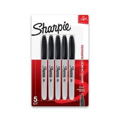 four sharpie markers in black and white packaging