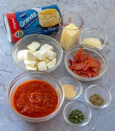 the ingredients to make this dish include cheese, tomato sauce, and ground meats