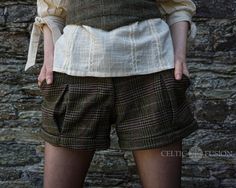 Tweed Aviator Shorts With Functional Pockets. Tweed Shorts Button up. and Zip Closure in the Front. Available in SMALL - uk Size 8, 10 Waist 30 inches. Hips 40 Inches Medium - UK 12. Waist 32 inches. Hips 43 Inches Large UK 14. Waist 34 inches. Hips 44 inches Celtic Fusion was designed to create a connection to nature through unique clothing. The designs are inspired by Celtic spirituality and ancient paganism - beliefs centered around the natural world and the cycle of life. So, naturally, sust Folklore Clothing, Celtic Clothing, Tweed Outfit, Fusion Design, Tweed Shorts, Fashion Shorts, Shorts Fashion, Folk Fashion, Celtic Designs