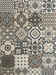 an assortment of black and white tile designs