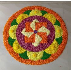 a colorful flower arrangement on the floor