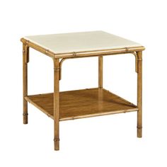 an end table with a white top and bamboo legs, on a white background in the image