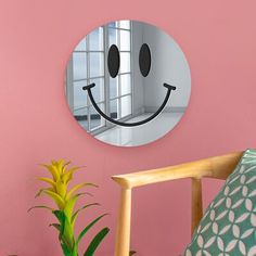 a mirror that has a smiley face on it