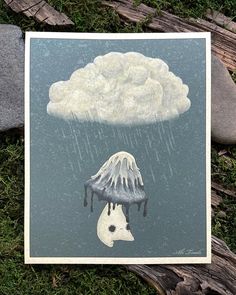 a card with an image of a jellyfish floating in the water under a cloud