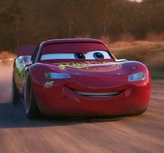 the character from cars is driving down the road