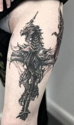 a person with a tattoo on their thigh