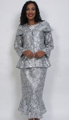 Introducing the HD Couture 5006 Church Suit, a stunning ensemble designed to bring elegance and grace to your formal wear collection. This meticulously crafted suit boasts a refined aesthetic that complements any special occasion, whether it's a church service, a formal gathering, or an elegant social event. The suit features a beautifully tailored jacket and skirt. The jacket's structured design creates a flattering, feminine silhouette, while the intricate lace detailing adds a layer of sophis Glamorous Fitted Suits For Party, Elegant Fitted Suits For Party, Elegant Fitted Party Suits, Elegant Fitted Party Sets, Elegant Long Sleeve Party Sets, Formal Long Sleeve Sets For Fall, Elegant Silver Wedding Sets, Elegant Fitted Suit For Gala, Glamorous Tailored Wedding Suits