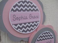 two pink and gray tags with chevrons on the bottom one says, sophia grace