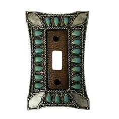 a decorative light switch plate with blue and green designs