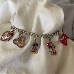 Authentic Disney Charm Bracelet Purchased At Disneyland Approximately 8 Inches Never Worn Mickey Bling Heart Is Missing A Stone, Which Sucks Because That Means I Bought It That Way You Can’t Tell Unless You Touch It, Still Looks Fine So Cute Clip On Charms, I’m Not Sure If They Still Sell The Charms, But Plenty Of Room To Add More Charms Approximately 3/4 Inches Silver Tone Bracelet Disney Silver Bracelet For A Gift, Silver Disney Bracelet As Gift, Silver Disney Charm Bracelet Gift, Disney Charm Bracelet, Silver Disney Mickey Mouse Jewelry, Disney Bracelet, Unique Backpacks, Disney Charms, Clip On Charms