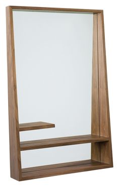 a wooden shelf with a mirror on it