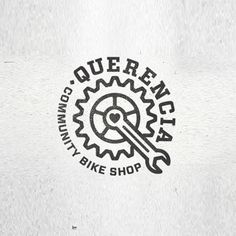 the logo for queen city bike shop