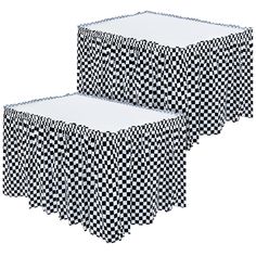 two black and white checkered tablecloths, one with a square design on it