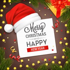 merry christmas and happy new year greeting card with santa hat on brown background stock photo