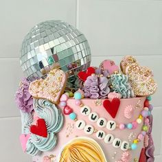 there is a cake that has been decorated with many things