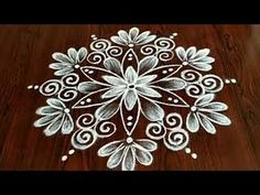 an intricate design on a wooden table