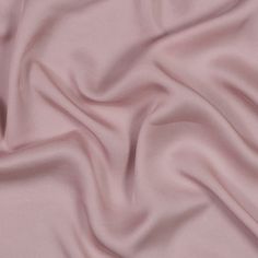 Live la vie en rose in this Dusty Rose Tencel Twill, featuring an ultra-soft hand, billowing drape, and subtle sheen.Suggested Projects:  Pants, Skirts, Shirts, DressesContent:  100% TencelStretch:  NoneOpacity:  TranslucentA pastel dusty rose colorway and an ultra-soft hand take this twill to the next level. Presenting a subtle sheen along its face, transform this woven into day-to-night looks for any season. From wide-leg trousers to shift dresses, it has a billowing drape that flows with ease Stagnant Water, Powder Blue Color, Rose Clothing, Dusty Rose Color, Mood Fabrics, Sleeves Designs For Dresses, Dress Forms, Designs For Dresses, Fabric Texture